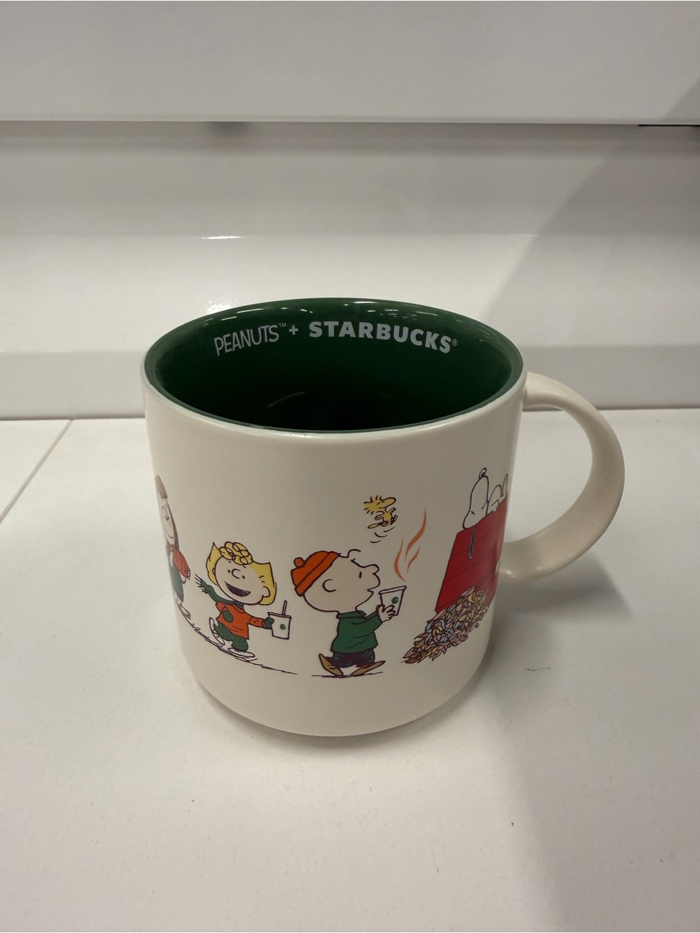 Starbucks Ceramic Mug showcases the Peanuts™ Gang - 14 oz